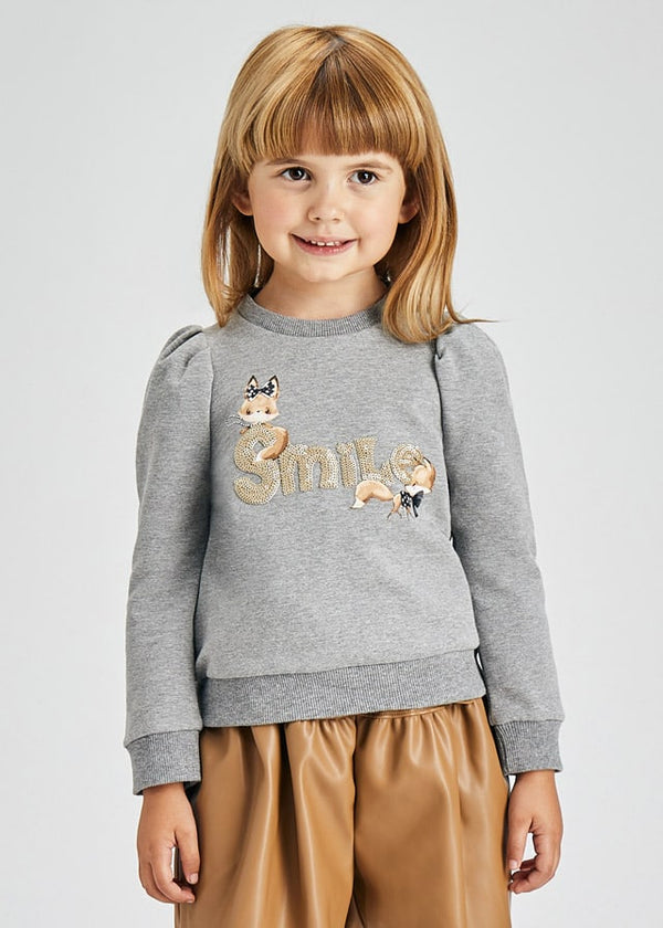 Pullover letra lentejuelas