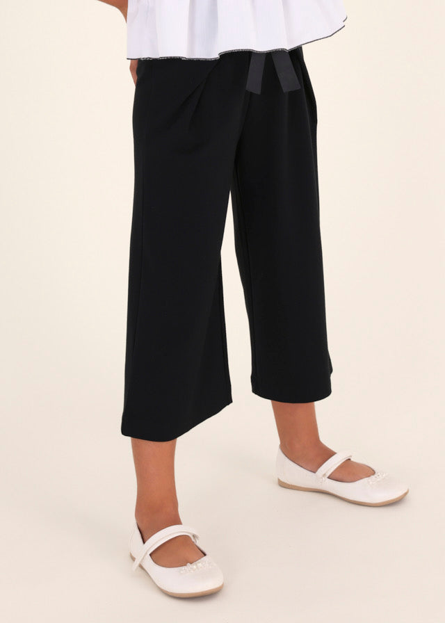 Pantalon cropped punto roma