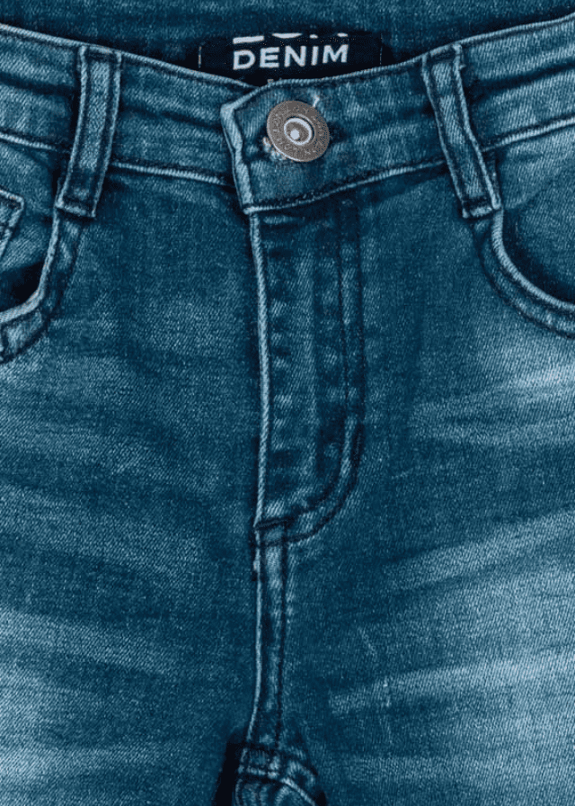 Pantalon denim con rotos